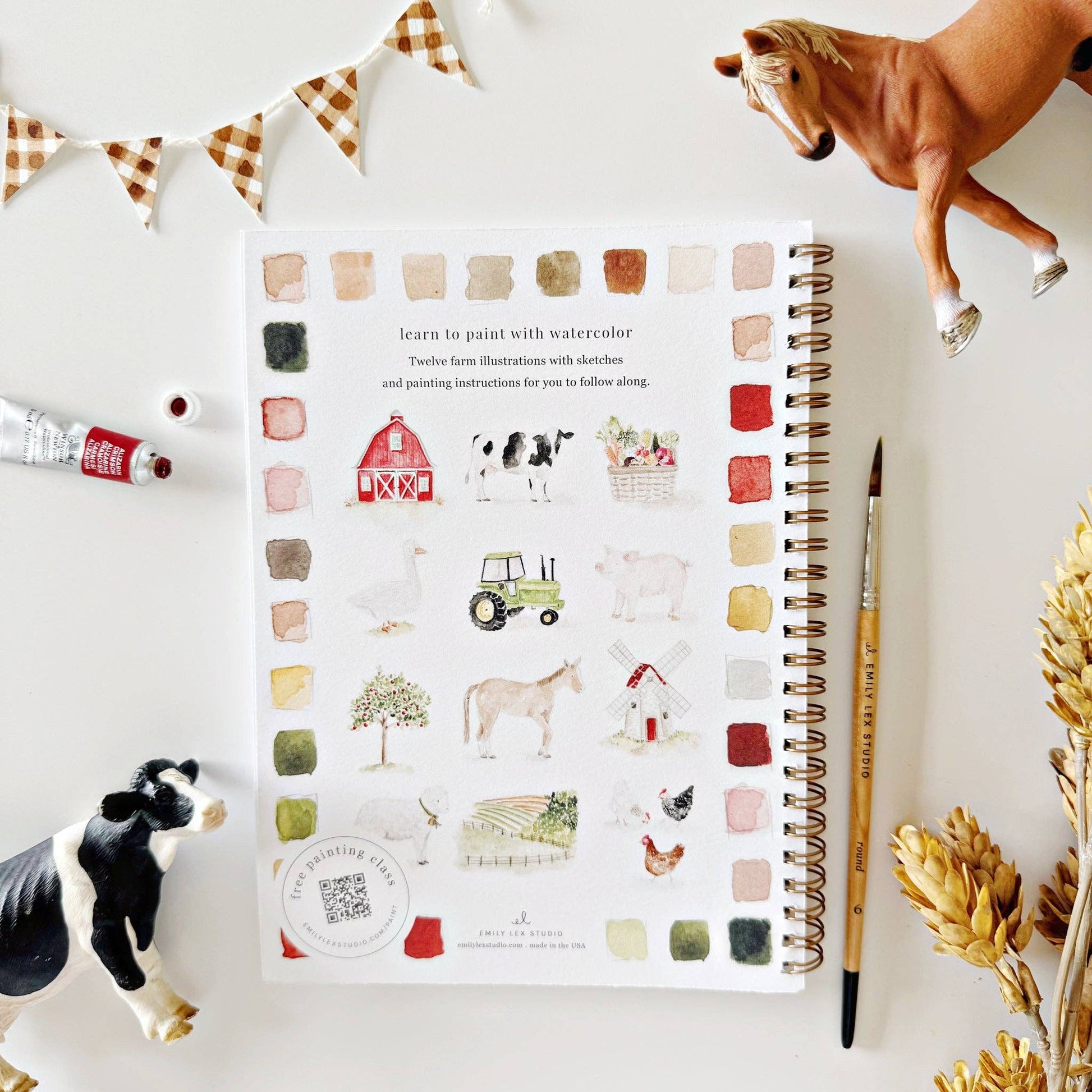 Spiral-bound Farm Watercolor Workbook coloring book with farm animal art; sizes available: standard and large.