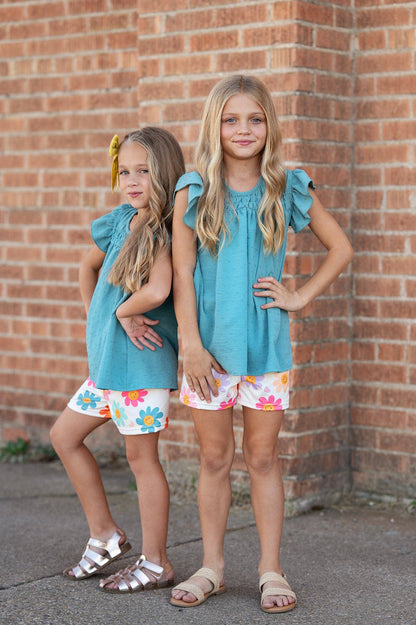 Girls Happy Flower Short Sets: colorful daisy prints, teal swiss dot flutter sleeve top. Available in sizes 2T-6X.
