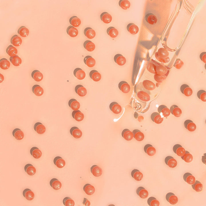 Clear dropper with liquid for Korean Collagen Firming Face Serum, available in 30ml and 50ml sizes.