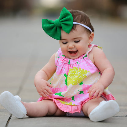 Pink floral spring ruffle swing tank top for baby girls. Available in sizes 12M-5T.