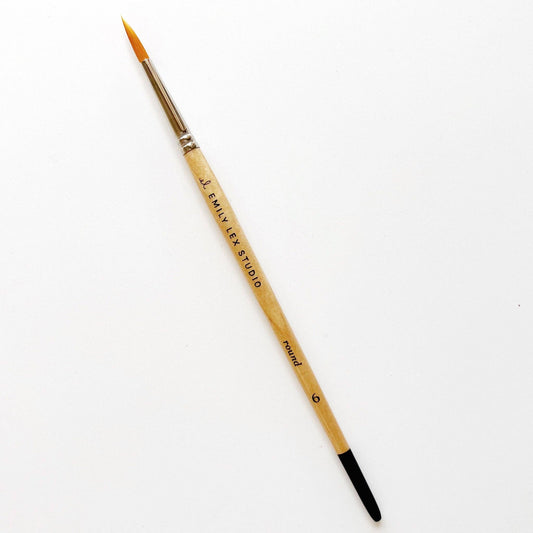 Watercolor paintbrush, Size 6, synthetic taklon bristles, wooden handle labeled "EMILY LEX STUDIO," silver ferrule, black tip.