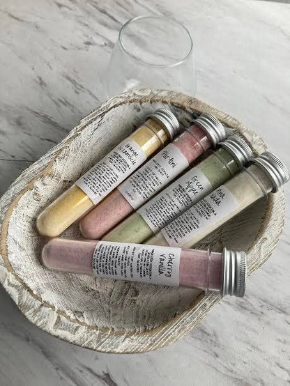 Five glass tubes of Cocktail Mix Shots with handwritten labels in a wooden bowl. Sizes available: standard 50ml tubes.