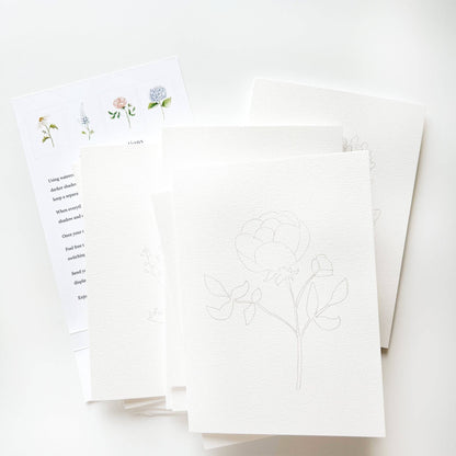 The Garden Flowers Paintable Notecards | Set of 8, white textured paper with floral sketches. Size info not shown.