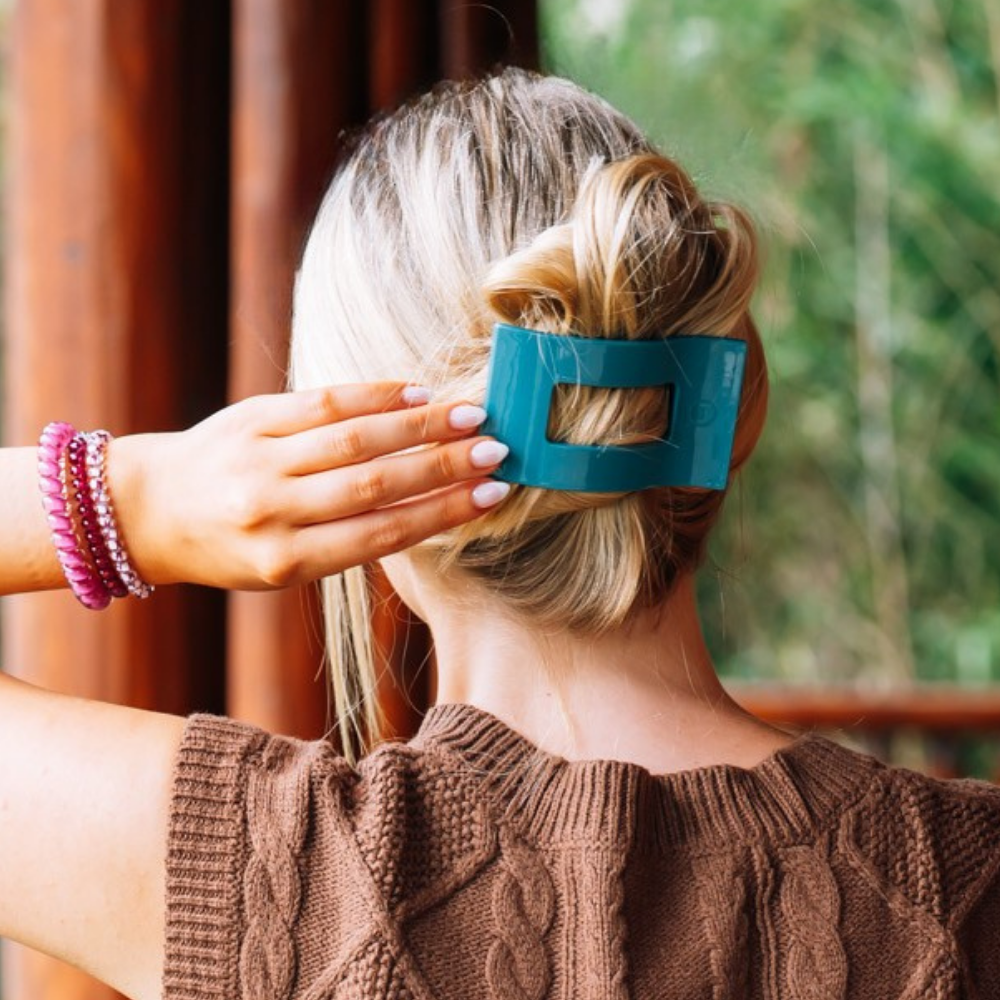 Teal With It Medium Flat Rectangle Hair Clip securing a blonde bun; available in medium size.