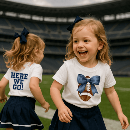 Football Toddler T-shirt Girls Tee, features football and bow print. Available in sizes 2T-5T.