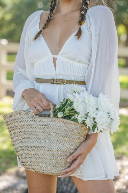 The Everyday Skinny Brass Buckle Leather Belt is a sleek, stylish accessory featuring a brass buckle. Available sizes: XS, S, M, L, XL.