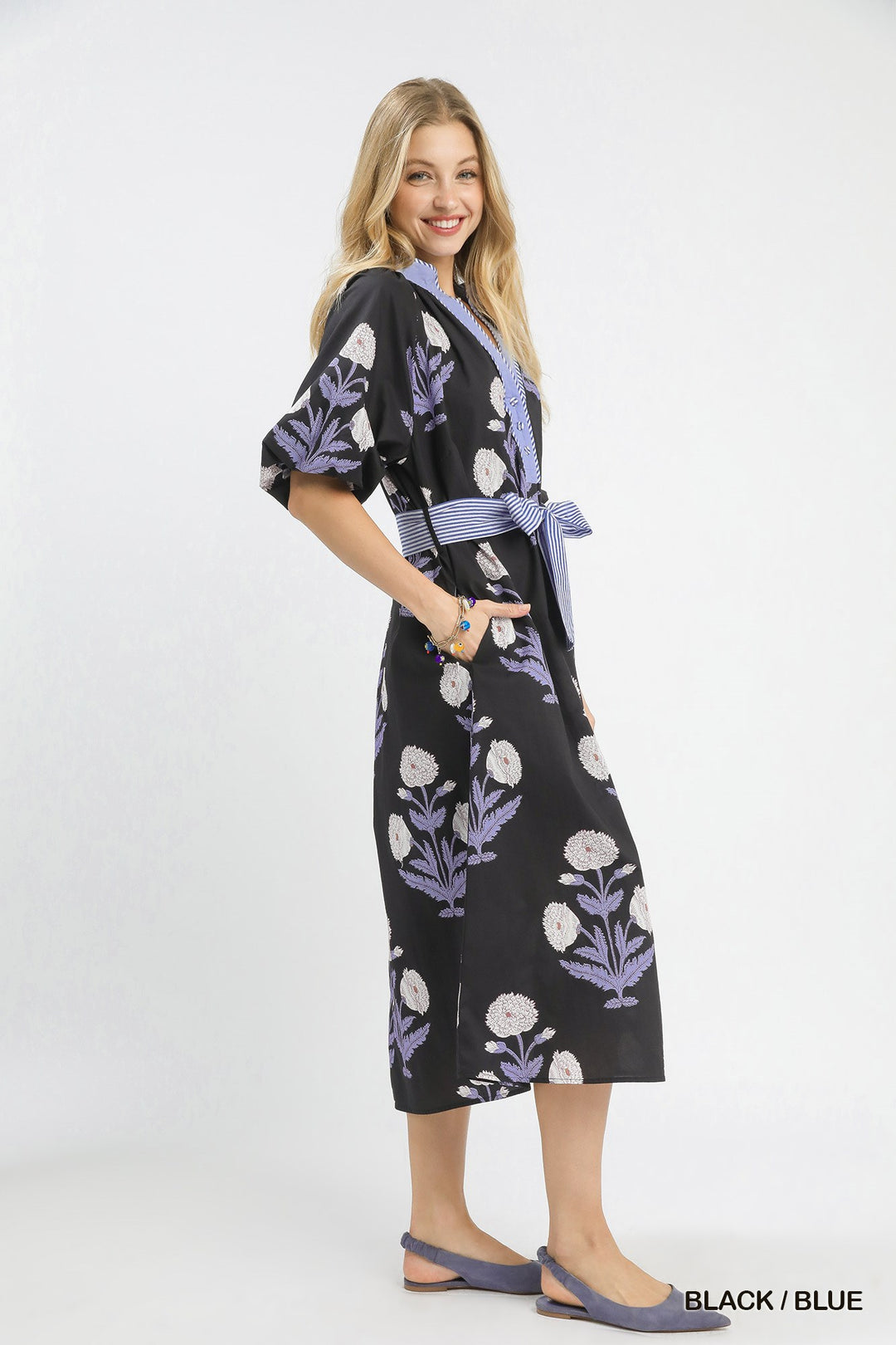 Carol Floral Print Midi Dress: black floral, striped belt, purple trim. Available in sizes XS-XL.