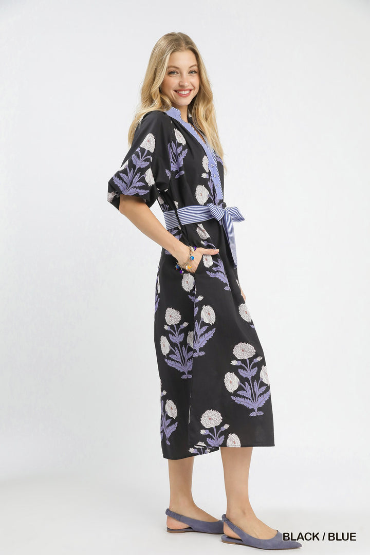 Carol Floral Print Midi Dress: black floral, striped belt, purple trim. Available in sizes XS-XL.