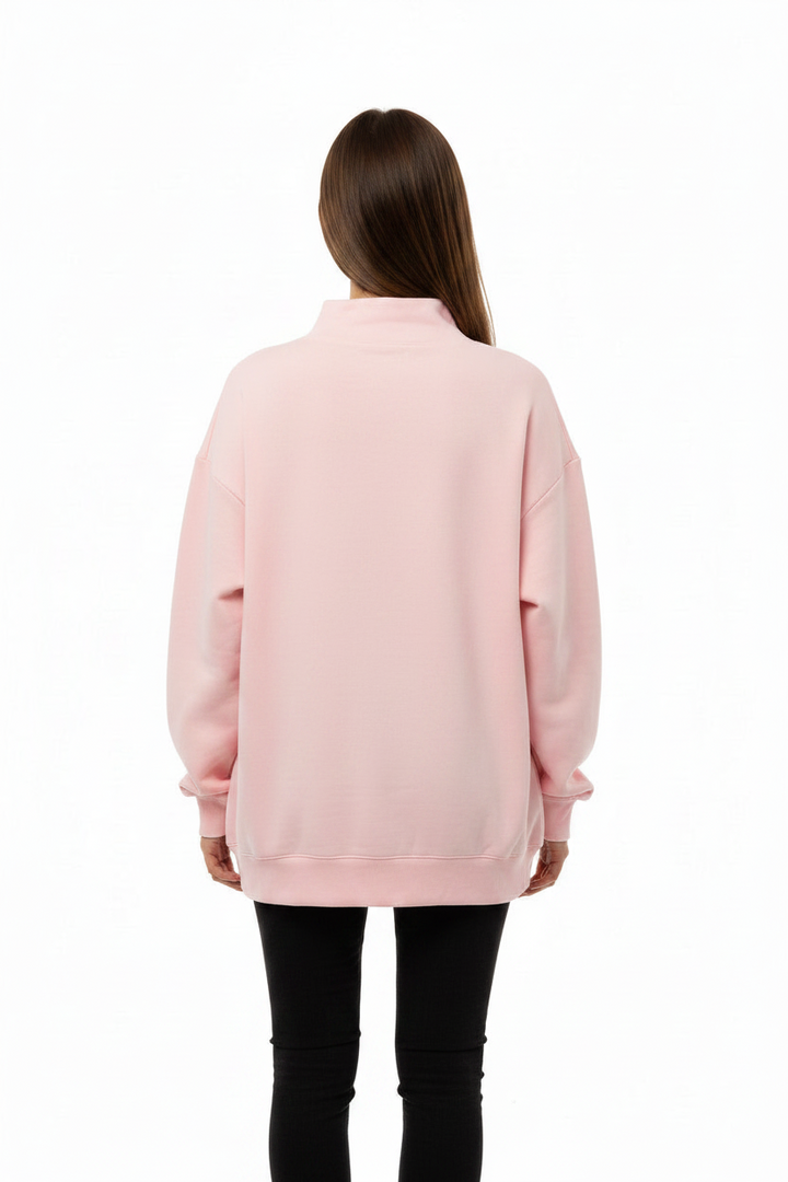 Kindness Mock Neck Sweatshirt in light pink. Available in sizes XS to XL.