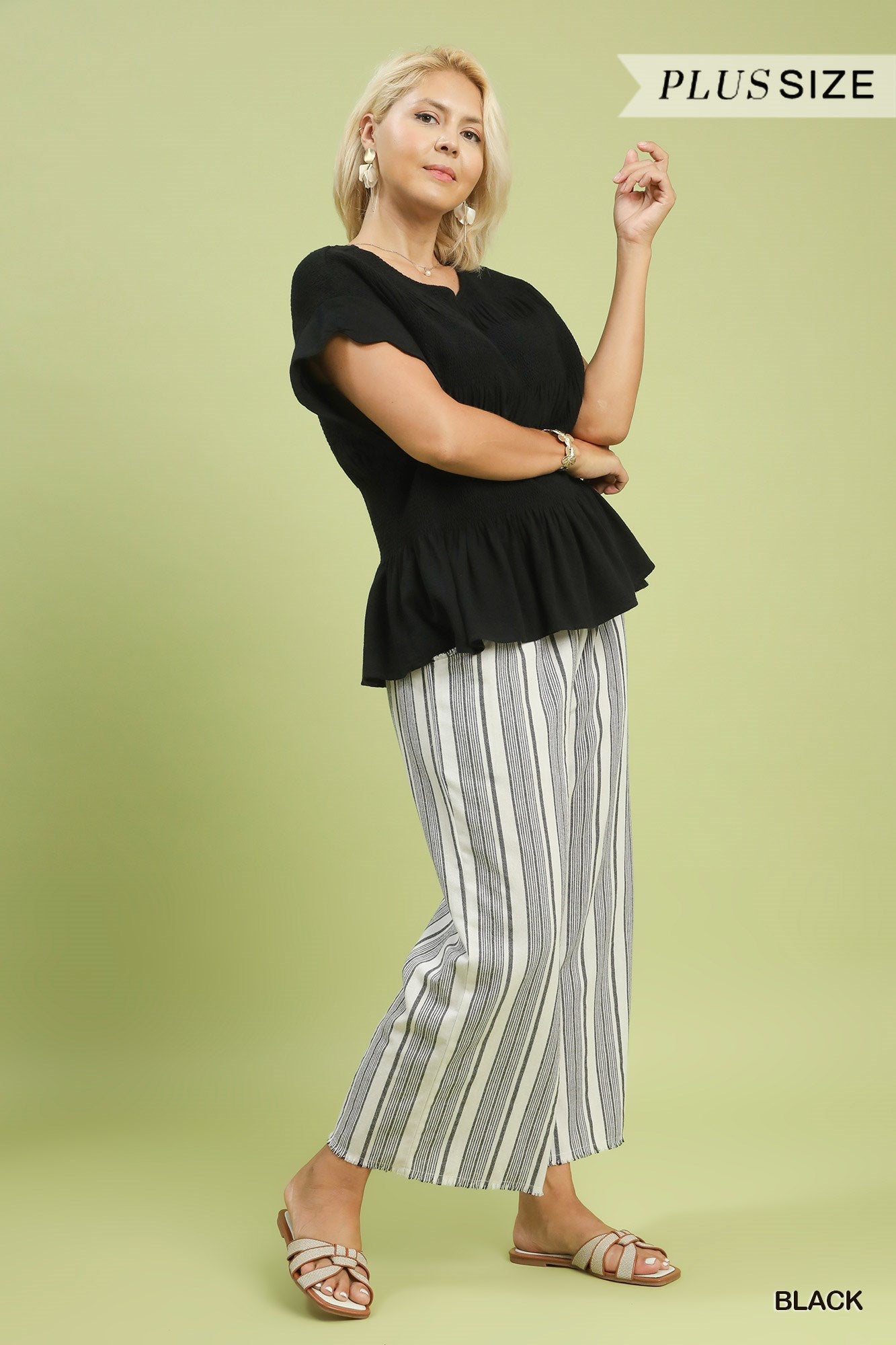 Amelia Smocked Peplum Top: black linen blend, scallop edge sleeves. Available in plus size. Color: Black.