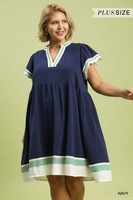 Navy Coast Linen Color Block Dress with white and green striped trim on the sleeves, neckline, and hem; available in sizes XS-XL.