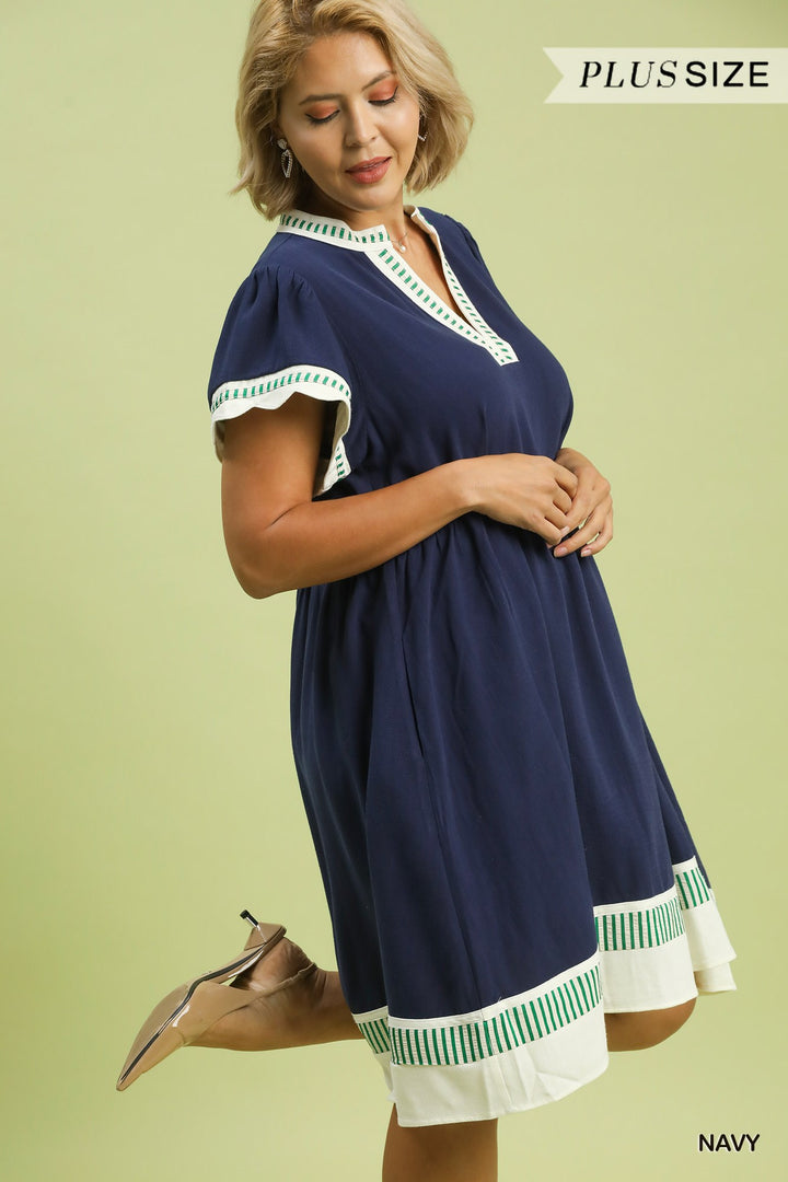 Navy Coast Linen Color Block Dress: plus-size, tiered, flutter sleeves, white and green trim. Available in sizes 1X-4X.