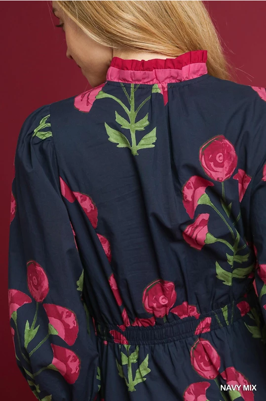 Louise Floral Midi Dress in navy with pink and green florals, ruffled pink collar. Available in sizes XS–XL.