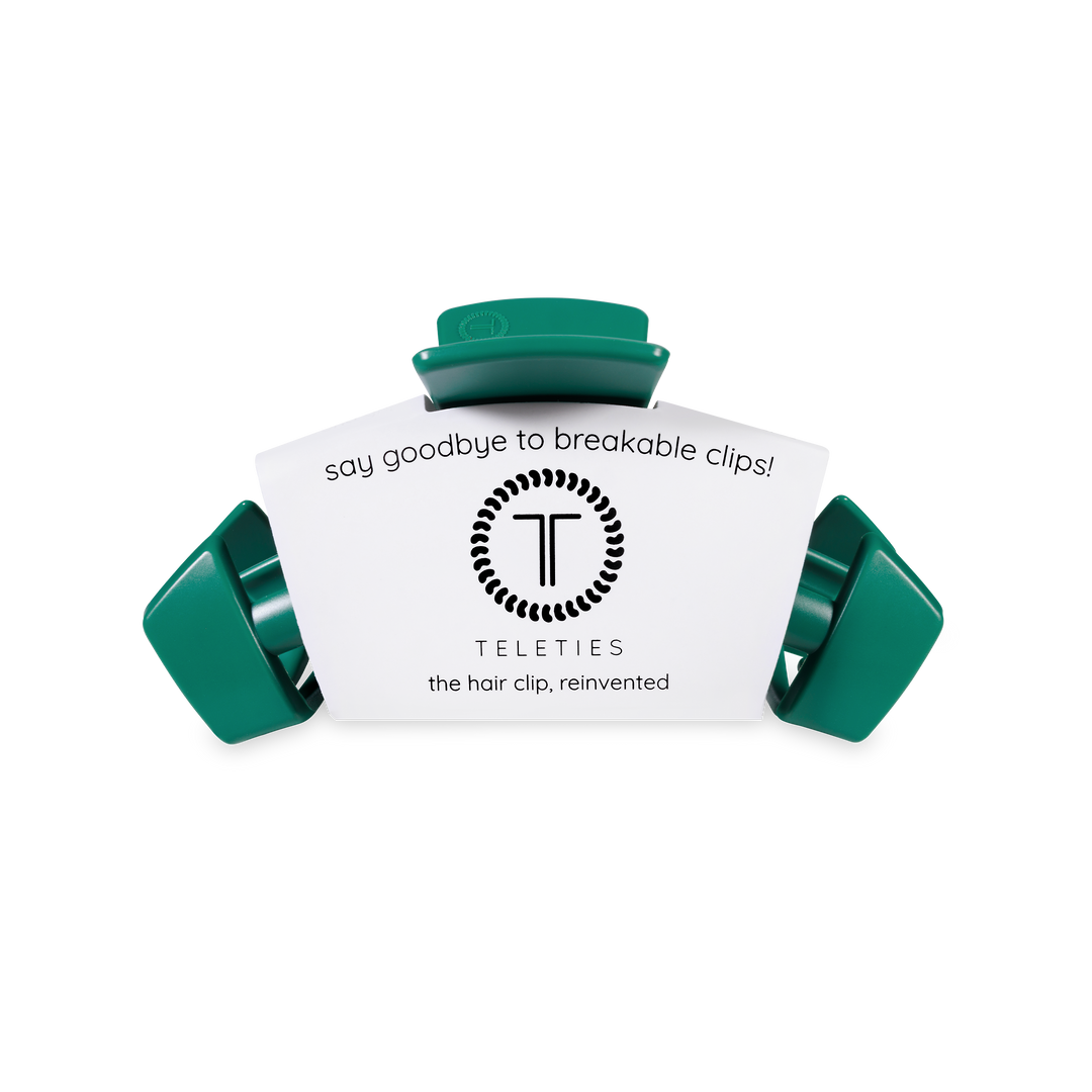 Matte green claw clip with white TELETIES label. Durable, stylish. Available in small, medium, and large sizes.