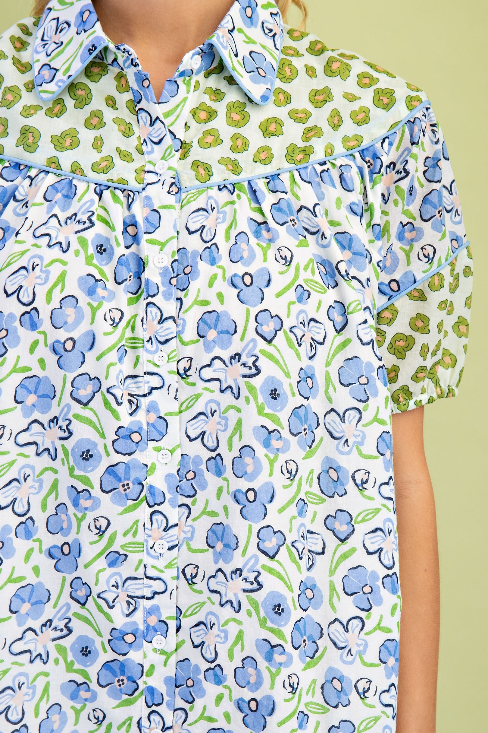 Miss Peony Floral Dress: blue and white florals, green yoke and sleeves with small prints. Available in sizes XS-XL.