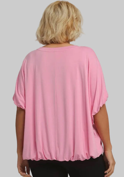 Loose-fitting, short-sleeved pink Bubble Sleeve & Hem Top with gathered edges. Available in sizes XS-XXL.