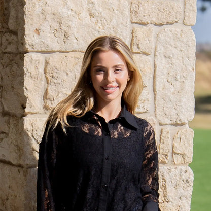 Kathryn Classic Lace Button-Up in black, features lace design and button closure. Available in sizes XS-XL.
