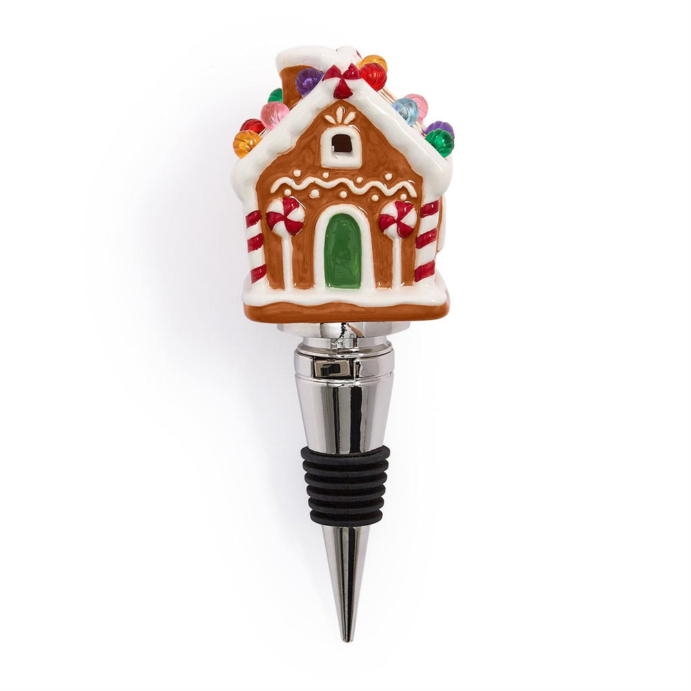 LED Gingerbread House bottle stopper with colorful lights and metal base.