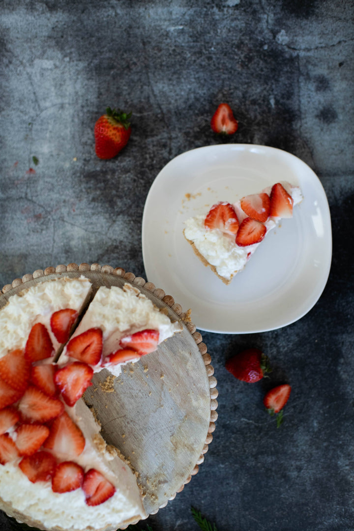 Strawberries N Cream Cheesecake Dip topped with sliced strawberries. Available in small, medium, and large sizes.