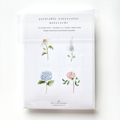 Set of 8 paintable notecards by Emily Lex Studio with four floral sketches; includes envelopes. Size not specified.