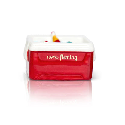 Red and white cooler-shaped Nora Fleming Minis container with "nora fleming" on front; small size.