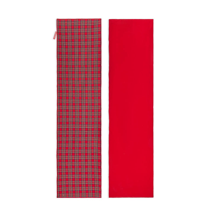 Tartan Traditions reversible table runner in red tartan plaid and solid red. Available in multiple sizes.