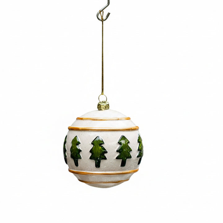 Westwood Ball Ornament: a cream round ornament with green painted trees and brown trim on a gold string.