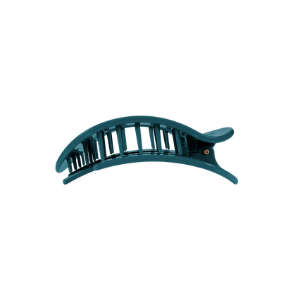 Teal plastic hair clip with open slats, hinge, and flat back; medium size.