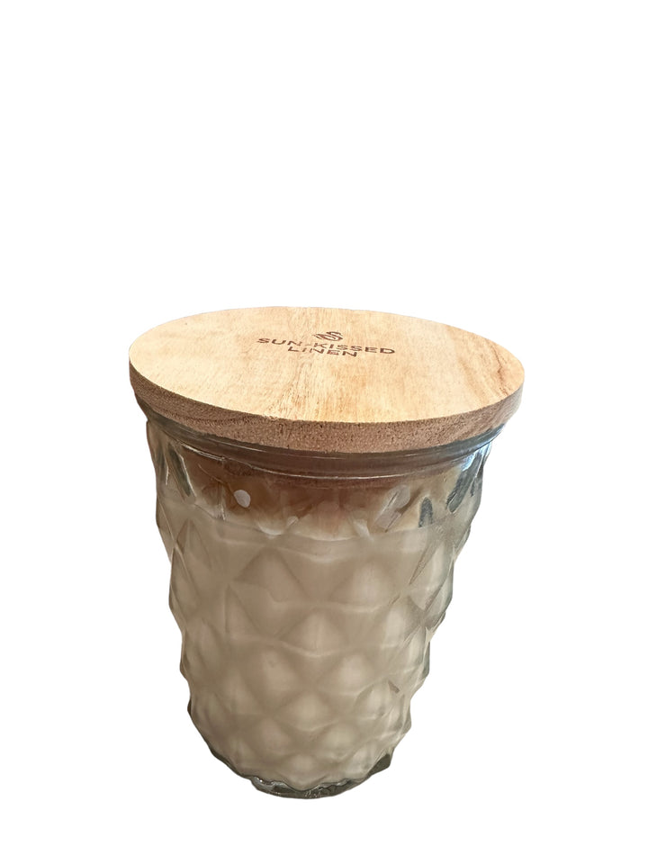 Timeless Jar Candle, 12oz size. Textured glass jar, light wooden lid, creamy off-white soy wax for long-lasting burn.