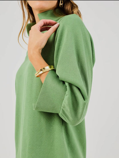 Hadley Green Dress with rolled-up sleeves. Available in sizes XS–XL.