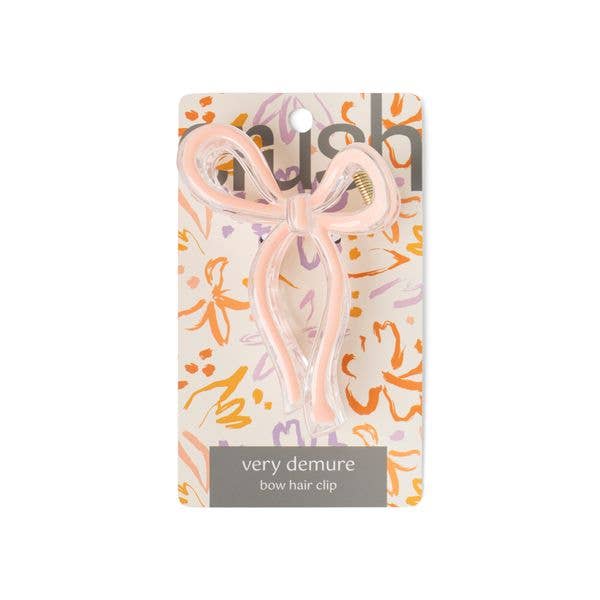 The Crush Very Demure Bow Hair Clip is a pink, bow-shaped clip available in small and large sizes.