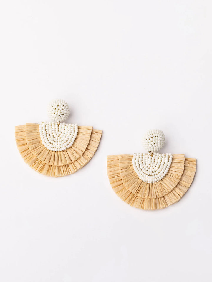 Corolla Earrings with round beaded studs, white seed bead arches, and raffia fringes. Sizes: small, medium, large.