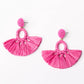 The Alexa Earrings are a unique pair highlighted by a circular beaded top and a fan-shaped tassel bottom in vibrant pink. Compact yet glamorous, these earrings provide bold punctuation to any attire. They are available in one standard size, perfect for an easy fit for everyone.