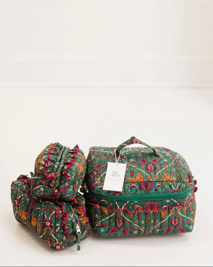 Hearthside Vine Luxe Quilted Cosmetic Set: two rectangular zippered cases and one ruffled zippered pouch in green floral print.