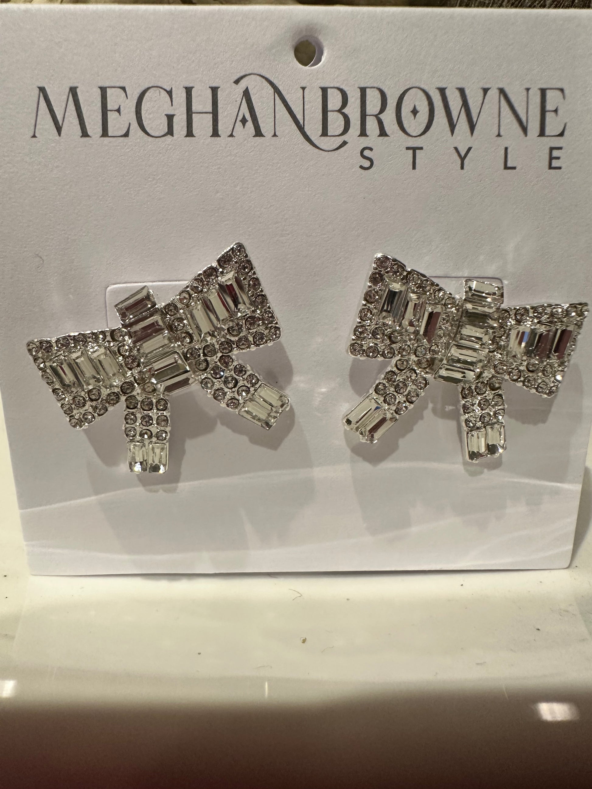Tandy Bow Earrings feature rectangular baguette crystals and round rhinestones. Available sizes: small, medium, large.