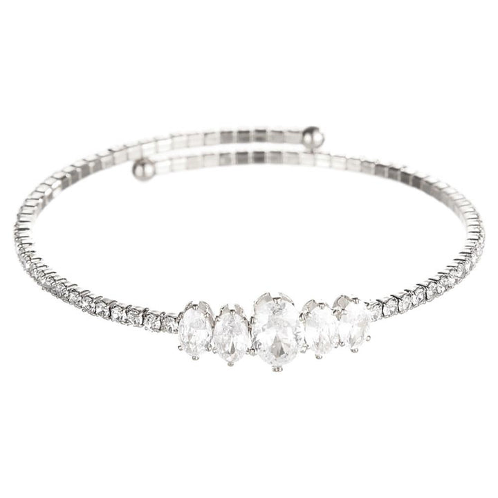 Delicate silver bangle with five oval clear gems and baguette crystals; available in S, M, L.