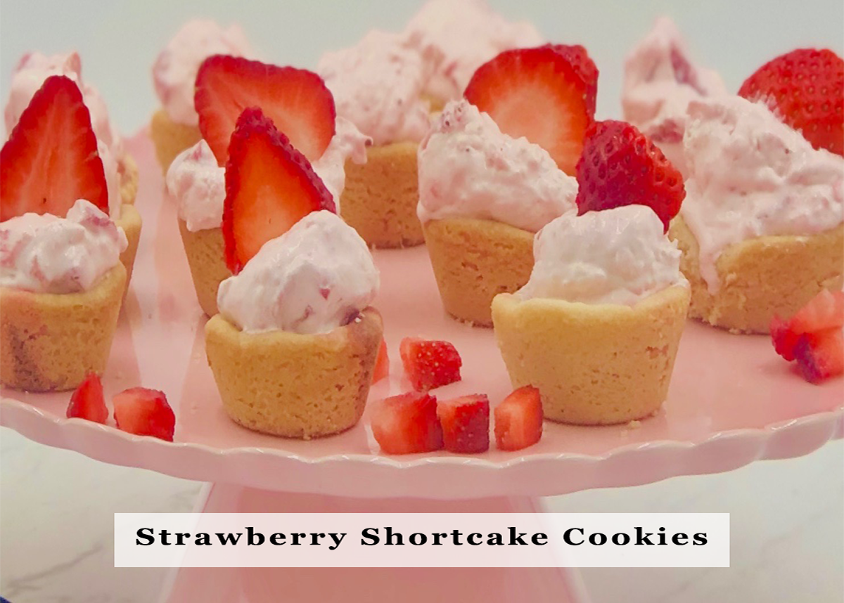 Mini cookie cups with Strawberries N Cream Cheesecake Dip, topped with strawberry slices. Sizes: mini only.