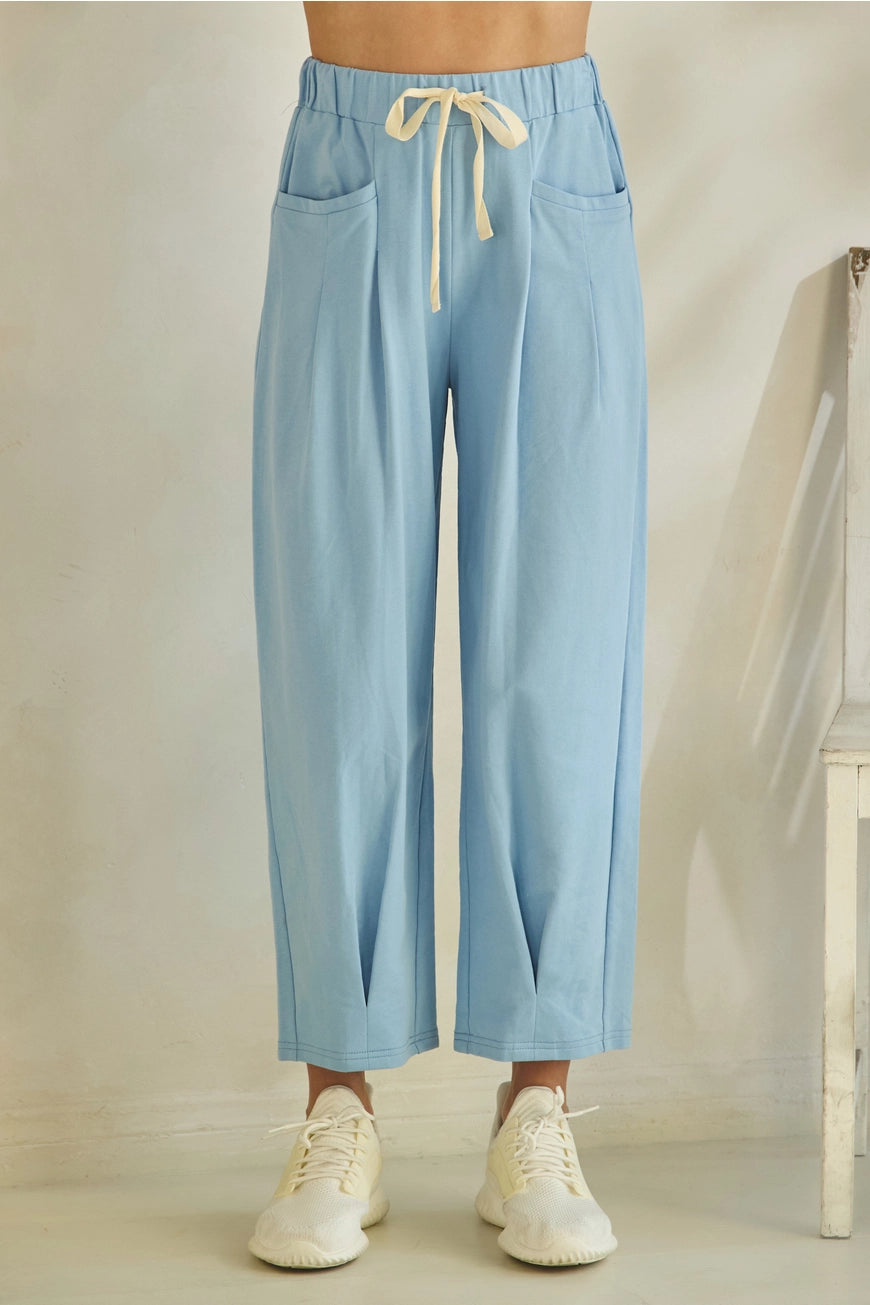 Effortless Blue Lounge Set: light blue drawstring pants with pockets, relaxed short-sleeve tee. Available in S–XL.