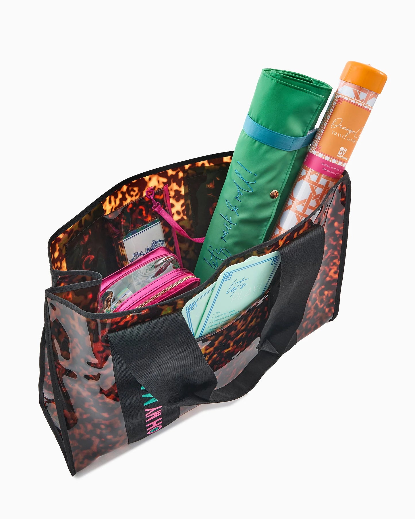 The Mahjong Beach Bag is a spacious, translucent tortoiseshell tote available in multiple sizes.