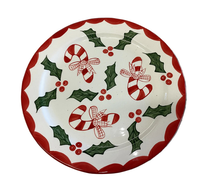 Holly Platter, a hand-painted ceramic platter with candy canes, holly, and a red scalloped rim.