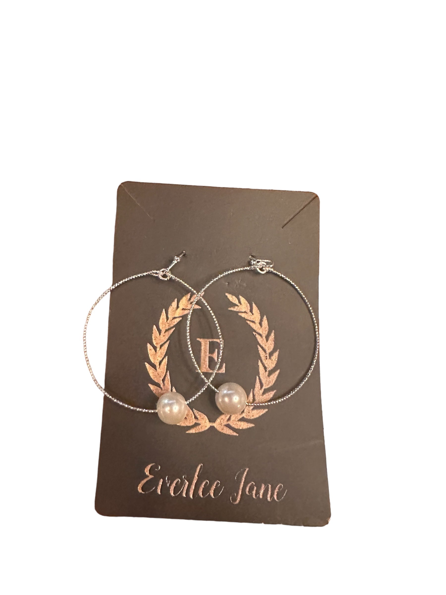 Elegant Pearl Hoop Earrings with large pearl beads. Sizes available: Medium, Large. Brand: Everlee Jane.