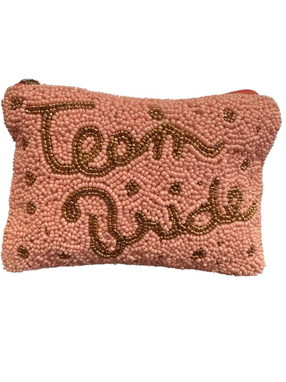 Small pink coin purse with gold "Bride" beads, gold dots, top zipper. Available in one size.