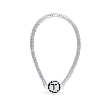 Clear, coiled TELETIES Spiral Hair Coil Headband with round "T" charm at center. Available in small and large sizes.