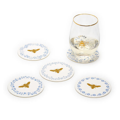 A set of five Bee and Blooms heavyweight paper coasters in white, featuring a gold bee design and blue floral border.