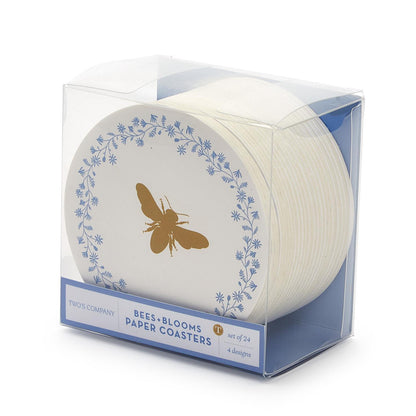 Set of 24 decorative disposable paper coasters in a clear box. Features a gold bee design and blue floral pattern. "Bee and Blooms Heavyweight Paper Coasters." Contains 4 designs.
