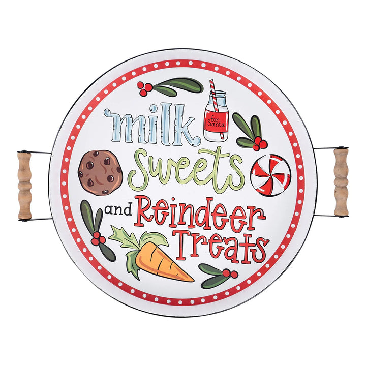 Milk Sweets &amp; Reindeer Treats Enamel Tray: a round white enamel tray with wooden handles, red polka dot border, holiday treat illustrations, and the text “Milk Sweets and Reindeer Treats.”.