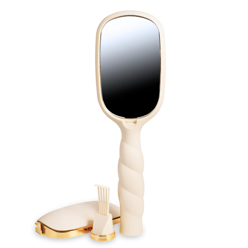 Teleties Hair Brush in cream with anti-static bristles, vented for easy detangling. Sizes: small, large. Twisted handle design.