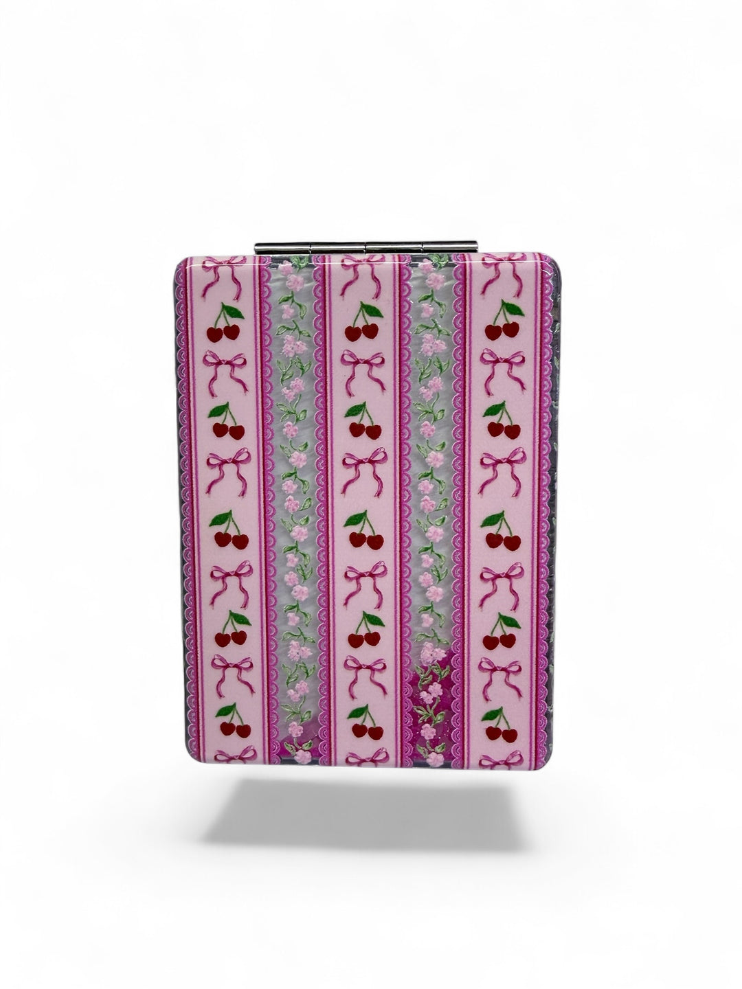 Bowtiful Things Compact Mirror in a pink box with cherry, bow, and heart stripes; silver clasp; sizes available.