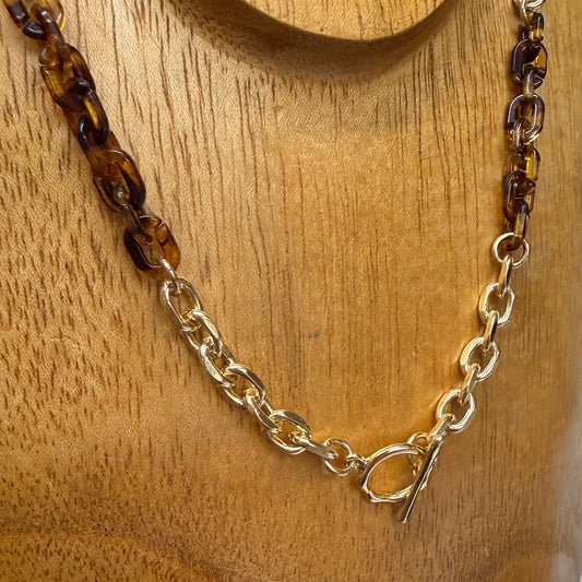 Eva Tortoise Toggle Necklace with gold and dark amber-colored chain links, front toggle clasp; available in 16", 18", and 20" lengths.
