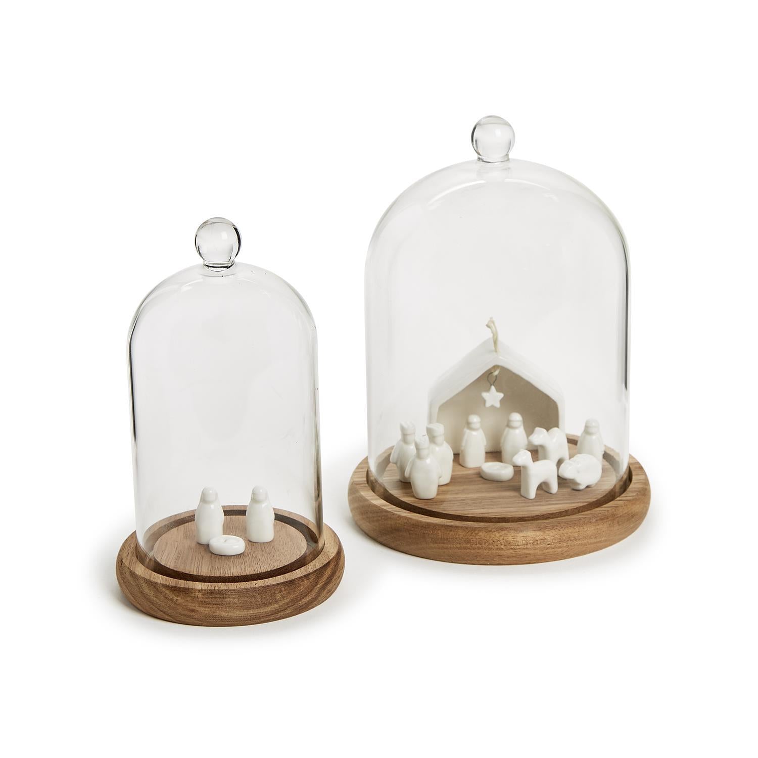 Glass cloche with ball handle and wood base. Available in multiple sizes.